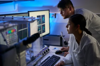 students in med lab looking at a screen